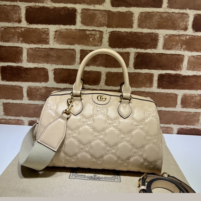G*u*i top handle bags